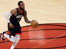 John Wall from the Houston Rockets during transition against the Miami Heat last season. (Image: Getty)