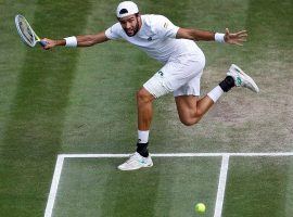 Matteo Berrettini hits a shot during the menâ€™s final of the 2021 Wimbledon tournament. (Image: Getty)