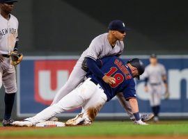 NY Yankees second baseman Gleyber Torres tries to tag out Minnesota Twins catcher Mitch Garber. (Image: Brad Rempel/USA Today Sports)