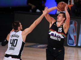 Ivica Zubac of the LA Clippers defends Denver Nuggets center Nikola Jokic in Game 6. (Image: Michael Reaves/Getty)