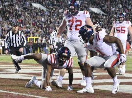 Ole Miss wide receiver Elijah Moore did a dog pee celebration after catching a touchdown that ended up costing both his team and bettors in Thursdayâ€™s game against Mississippi State. (Image: USA Today Sports)