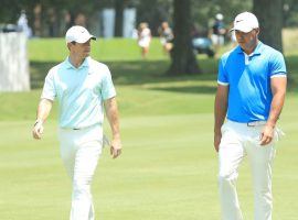 Rory McIlroy, left, took over the No. 1 ranking in golf over Brooks Koepka on Sunday. (Image: Getty)