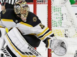 Tuukka Rask, goalie for the Boston Bruins, fends off a puck against the Carolina Hurricanes in the Eastern Conference Finals. (Image: AP)