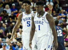 Duke's R.J. Barrett (5) congratulates Zion Williamson (1) during an exhibition game in Mississauga, Ontario, Canada during preseason. (Image: Christopher Katsarov/AP)